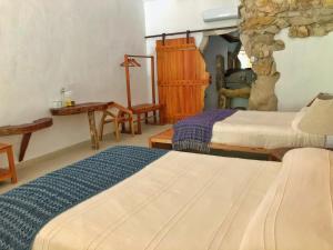 A bed or beds in a room at Finca Vallescondido