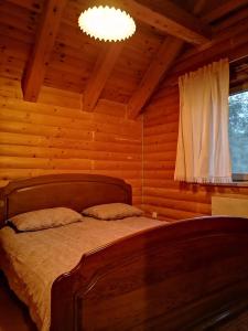 Ein Bett oder Betten in einem Zimmer der Unterkunft Villa Romantica
