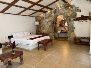 A bed or beds in a room at Finca Vallescondido