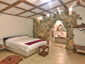 A bed or beds in a room at Finca Vallescondido