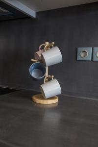 a toilet with two rolls of toilet paper in a room at Raise Spetses Sea View Villa in Spetses