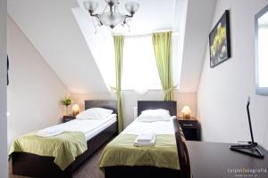 Posteľ alebo postele v izbe v ubytovaní Hotel Millenium + 37 fotografií