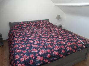 Postel nebo postele na pokoji v ubytování Gîte Le pt'i Baillis