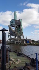 a large metal structure next to a body of water at Alexandra House in Goole