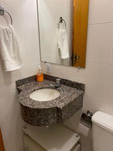 Studio em Caxambu tesisinde bir banyo