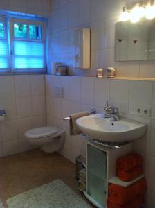 Ванная комната в Ferienwohnung zur BlauEnte