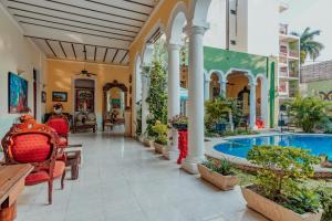 Bazén v ubytování Hotel Santa María Mérida nebo v jeho okolí