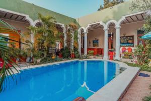 Bazén v ubytování Hotel Santa María Mérida nebo v jeho okolí