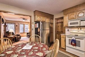 A kitchen or kitchenette at Serene Orchard Park Apartment Large Yard and Patio!