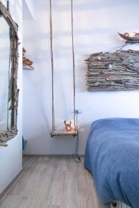 A bed or beds in a room at B&B Rabbit
