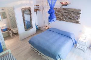 A bed or beds in a room at B&B Rabbit
