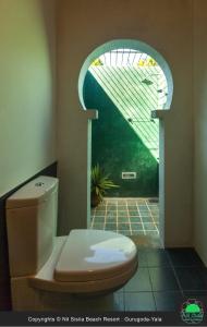 Ein Badezimmer in der Unterkunft Nil Sisila Beach Resort Yala