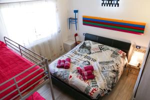 A bed or beds in a room at B&B Rabbit