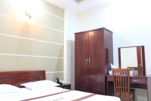Giường trong phòng chung tại YaYa Sai Gon Hotel Bui Vien Walking Street