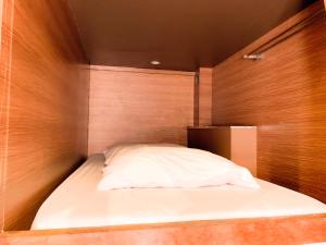 Posteľ alebo postele v izbe v ubytovaní Omah Pelem Syariah