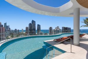 a swimming pool on the roof of a building at The Gallery Residences Broadbeach in Gold Coast