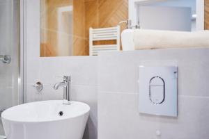 Koupelna v ubytování Apartament HORYZONT "ZŁOTA"