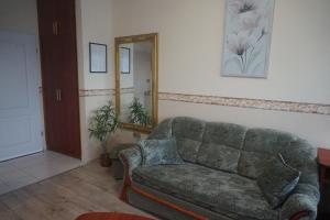Posezení v ubytování Hotel Ajka Üzletház Panzió Ajka