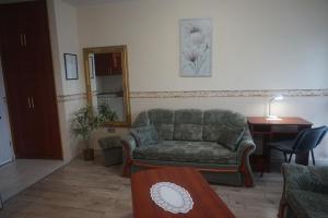 Posezení v ubytování Hotel Ajka Üzletház Panzió Ajka