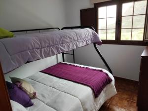 Postel nebo postele na pokoji v ubytování Casa LA JOYA