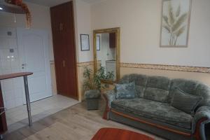 Posezení v ubytování Hotel Ajka Üzletház Panzió Ajka