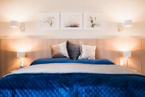 Posteľ alebo postele v izbe v ubytovaní Harmonia Apartamenty Ustroń