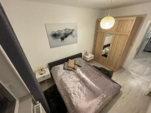 Postel nebo postele na pokoji v ubytování Apartament na Spokojnej