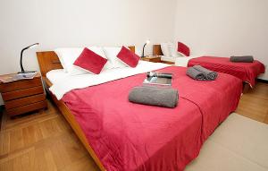 En eller flere senge i et værelse på Vila Castello