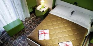 Postel nebo postele na pokoji v ubytování Affittacamere b&b meapvlia