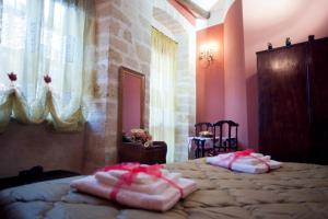 Postel nebo postele na pokoji v ubytování Affittacamere b&b meapvlia