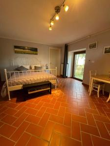 Postel nebo postele na pokoji v ubytování Casa vacanze La Foresteria