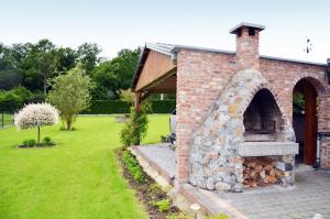 Vonkajšia záhrada v ubytovaní Gîte Le petit coin de paradis Sautin