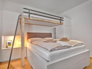 Postel nebo postele na pokoji v ubytování Sonnenhaus Schladming Dachstein