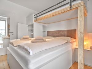 Postel nebo postele na pokoji v ubytování Sonnenhaus Schladming Dachstein