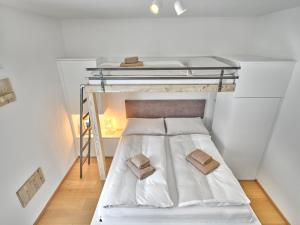 Postel nebo postele na pokoji v ubytování Sonnenhaus Schladming Dachstein