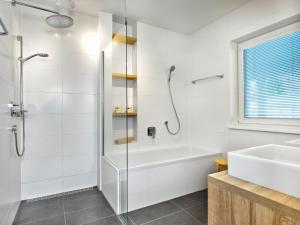 Koupelna v ubytování Sonnenhaus Schladming Dachstein + 31 fotografií