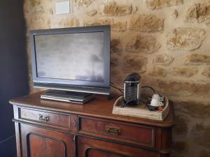 TV tai viihdekeskus majoituspaikassa Campo Golden Heritage