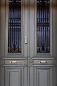 a white door with a window on top of it at Mansion Argyrakiko - 3 bedroom house in Kampos in Chios