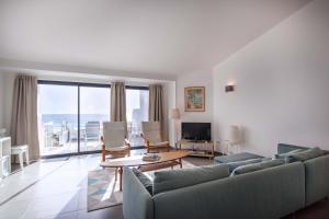 TV a/nebo společenská místnost v ubytování Beco Do Poço