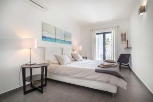 Postel nebo postele na pokoji v ubytování Beco Do Poço + 22 fotografií