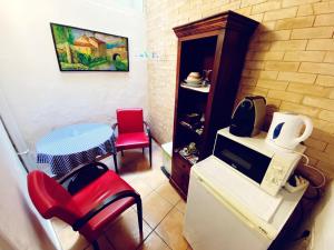 Kuchyň nebo kuchyňský kout v ubytování Pensión Antonio Guesthouse