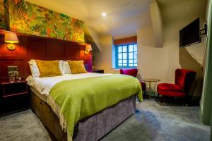 Katil atau katil-katil dalam bilik di The Crown Hotel