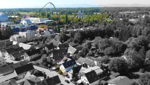 an aerial view of a city with a roller coaster at Gästehaus Parkblick in Rust