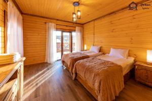 Llit o llits en una habitació de Eco Homes Tsaghkadzor