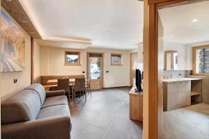 TV a/nebo společenská místnost v ubytování Rasia Residence Relax Mountain