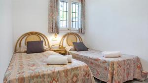 Postel nebo postele na pokoji v ubytování 1 Mars pl - Llafranc