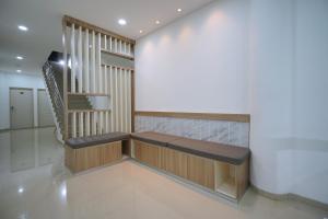 Katil atau katil-katil dalam bilik di Ngampilan Residence Yogyakarta Mitra RedDoorz