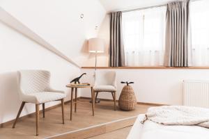 Posezení v ubytování Alpines Gourmet Hotel Montanara