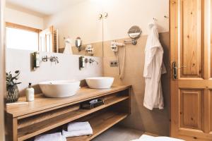 Koupelna v ubytování Alpines Gourmet Hotel Montanara