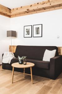 Posezení v ubytování Alpines Gourmet Hotel Montanara